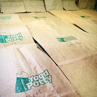 a pile of brown paper bags