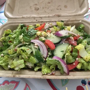 Can't just eat one little square! We ordered a full Greek salad on the side for 6 extra bucks. Be sure to load up on the banana peppers!