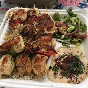 Chicken plate with an extra skewer. The standard is 2 skewers for 9 bucks. Extra skewers are 3 bucks a pop.