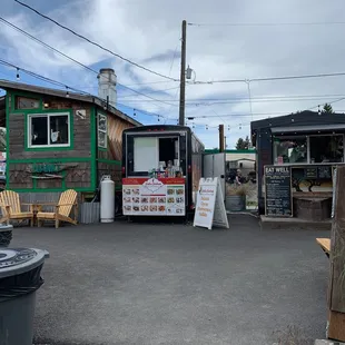a food truck parked in front of a building