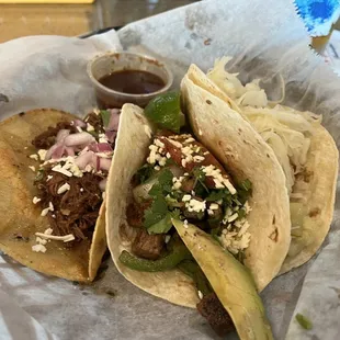 Birria taco, Fajita taco, Nashville hot chicken taco