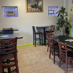 a restaurant with tables and chairs