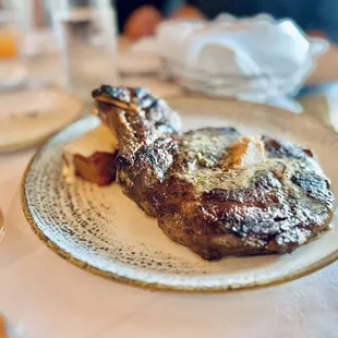 22-oz Angus Bone-In Rib-Eye, Prime* with garlic butter