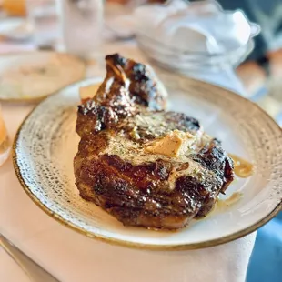 22-oz Angus Bone-In Rib-Eye, Prime* with garlic butter