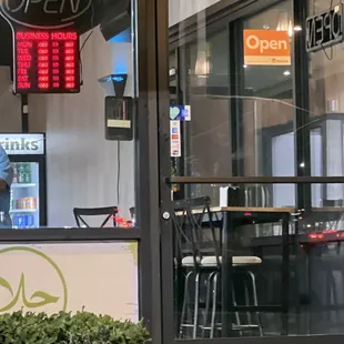 a woman walking by the door