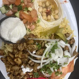 Chicken Shawarma with hummus and Greek salad.