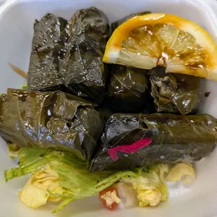 Dolmades, with a drizzle of pomegranate