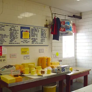 Behind the counter, with price menu