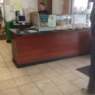 Counter with 7 different pizza choices