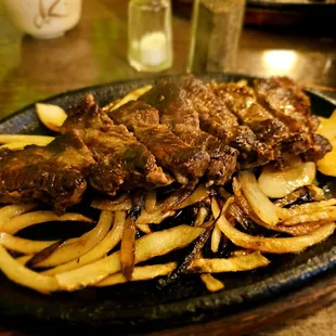 Dinner@Yagura Restaurant; 11/17/2023. David &amp; I both ordered, NY Steak on Sizzling Platter. David/Med Rare, Mine/Med Well. So Stuffed! Lol!