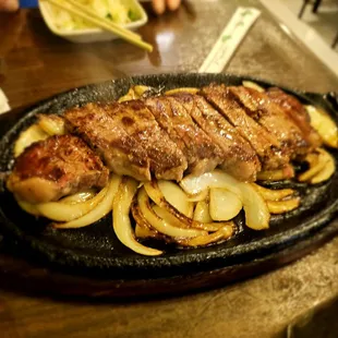 Dinner @Yagura Restaurant last evening; 6/29/2024. Hubby David ordered the *New York Steak* on the Sizzling Platter. Da Onions R Ono!