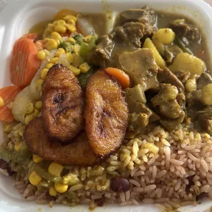 Curry goat, mixed veggies, Plantains, Rice And Peas