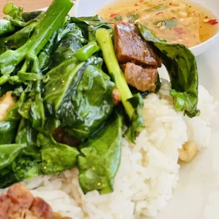 Garlic Crispy Pork Belly with Chinese Broccoli. Served over Jasmine rice. Amazingly good!!