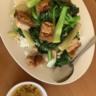 Roasted pork and Chinese broccoli on rice