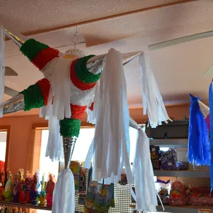 a variety of tassels hanging from the ceiling