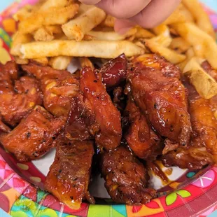 Ribs and Fries: It&apos;s on the menu as Korean Ribs but tasted more like american BBQ sauce with something spicy added to it, still tasted fine