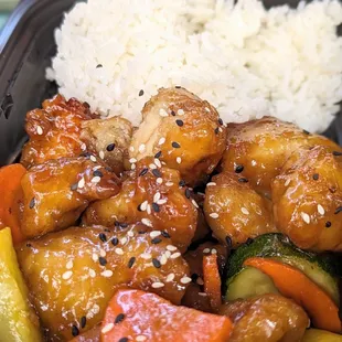 Honey Chicken: Their version of Orange Chicken, loved how it came with some vegetables and the rice was well made. It&apos;s on the smaller side