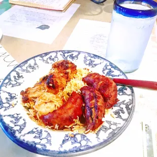 Lunch leftovers: Chili Chicken Momos, Shrimp Biryani, Basmati Rice, and Tandoori Chicken Wings! YUM