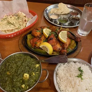 Tandoori chicken, saag paneer, garlic naan and complimentary appetizer