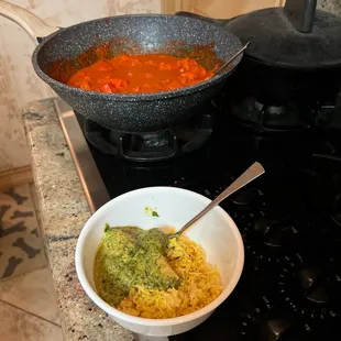 a bowl of food on a stove