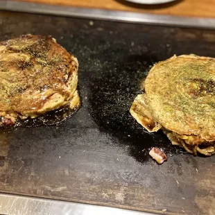 Miwa's Special Tama Okonomiyaki (left) and Seafood Modan-yaki