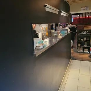 a view of a restaurant kitchen