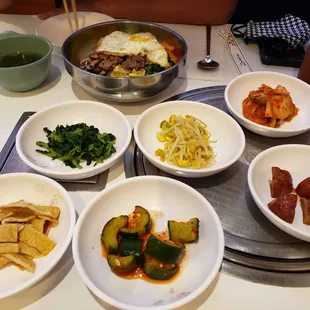 Ban Chan! (cucumber &amp; cabbage kim chee, fish cake, bean sprouts, watercress and shoyu potato) The seafood soup came with the Bi Bim Bap.