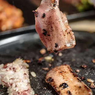 a piece of meat on a skewer