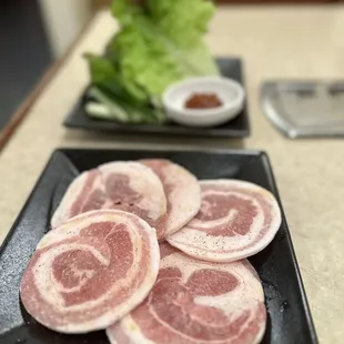a plate of sliced yakini