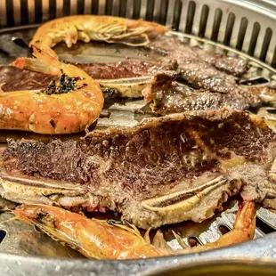 The smoke gets absorbed through the vents built into the cooking area
