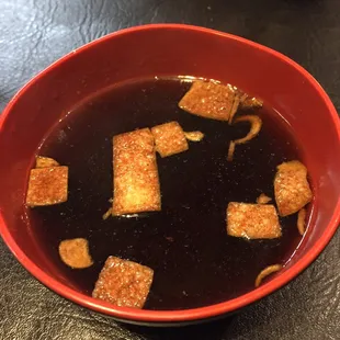 Soup that came with meals.  Tasted like beef broth with hoisin sauce mixed in.