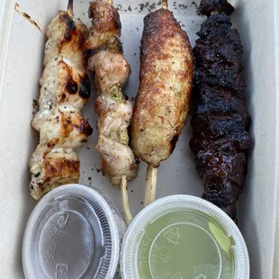 skewers of meat and sauce