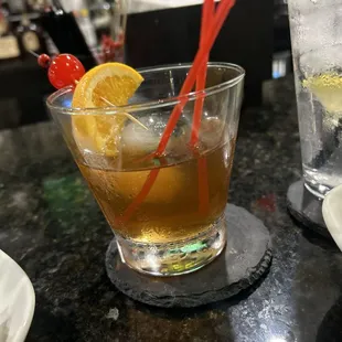 Old Fashioned!!! With the glass smoked in rosemary!!!! DELICIOUS!!!