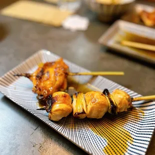 Yakitori Negima (bottom) and Nakamoto Chicken Wing (top)