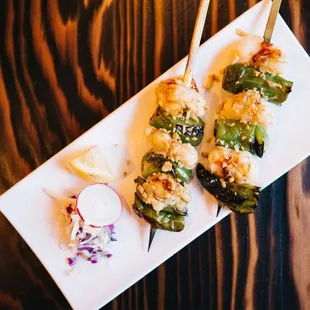 a plate of food on a wooden table