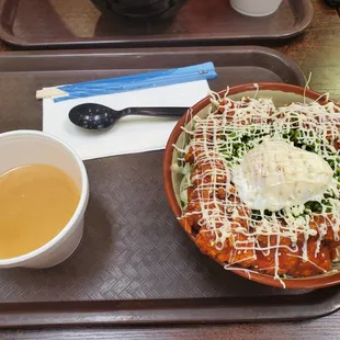 a plate of food and a cup of tea