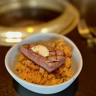 bone marrow fried rice with filet mignon medium rare