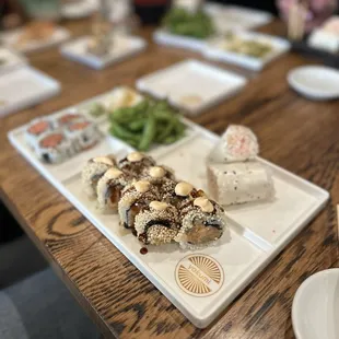 Crunchy Roll, Spicy Tuna Roll, Baked Crab Roll, and Edamame