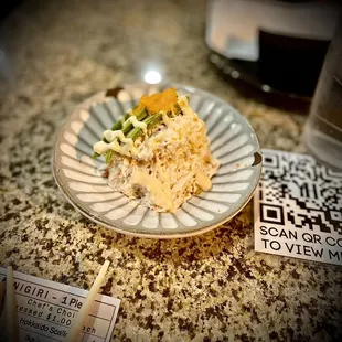 a plate of food with a qr code on it