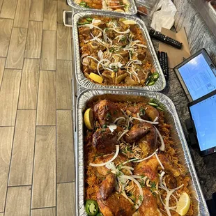 a long line of trays of food