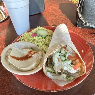 a burrito and side salad