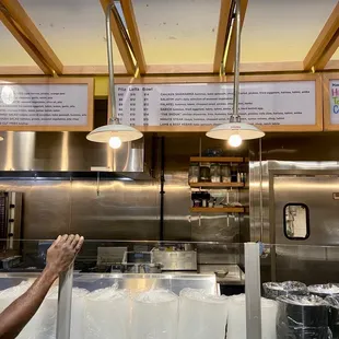 a man working in a restaurant kitchen