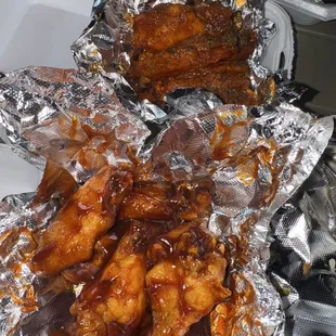 Bbq wings and lemon pepper with hot sauce