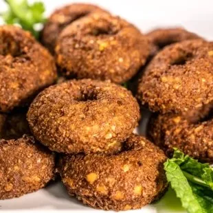 a pile of fried doughnuts