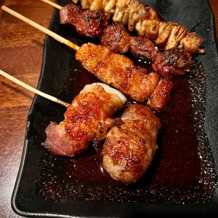 Bacon with scallops Chicken gizzards  Pork cheeks Chicken skin