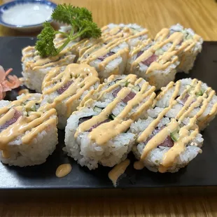 Spicy tuna roll (that's all one roll, and it's absolutely amazing, big pieces of tuna in every bite!)