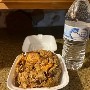 I ordered the house fried rice to go $18 and this is what they gave me. A little tiny container for $18.