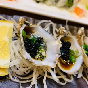 Raw Oyster served with Uni Japanese / Sea urchin