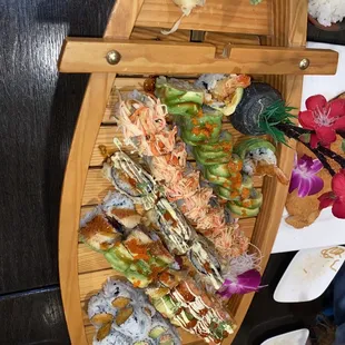 a row boat full of sushi