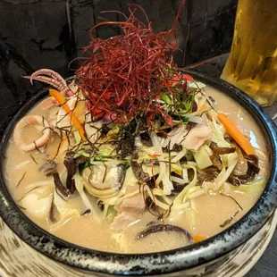 Champon. Definitely recommend. Loaded with seafood, quail egg, veggies. Can serve two!